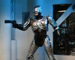 NECA Robocop 7” Scale Ultimate Battle Damaged RoboCop With Chair Action Figure -Toy Sale Store BD Robocop4 scaled 1